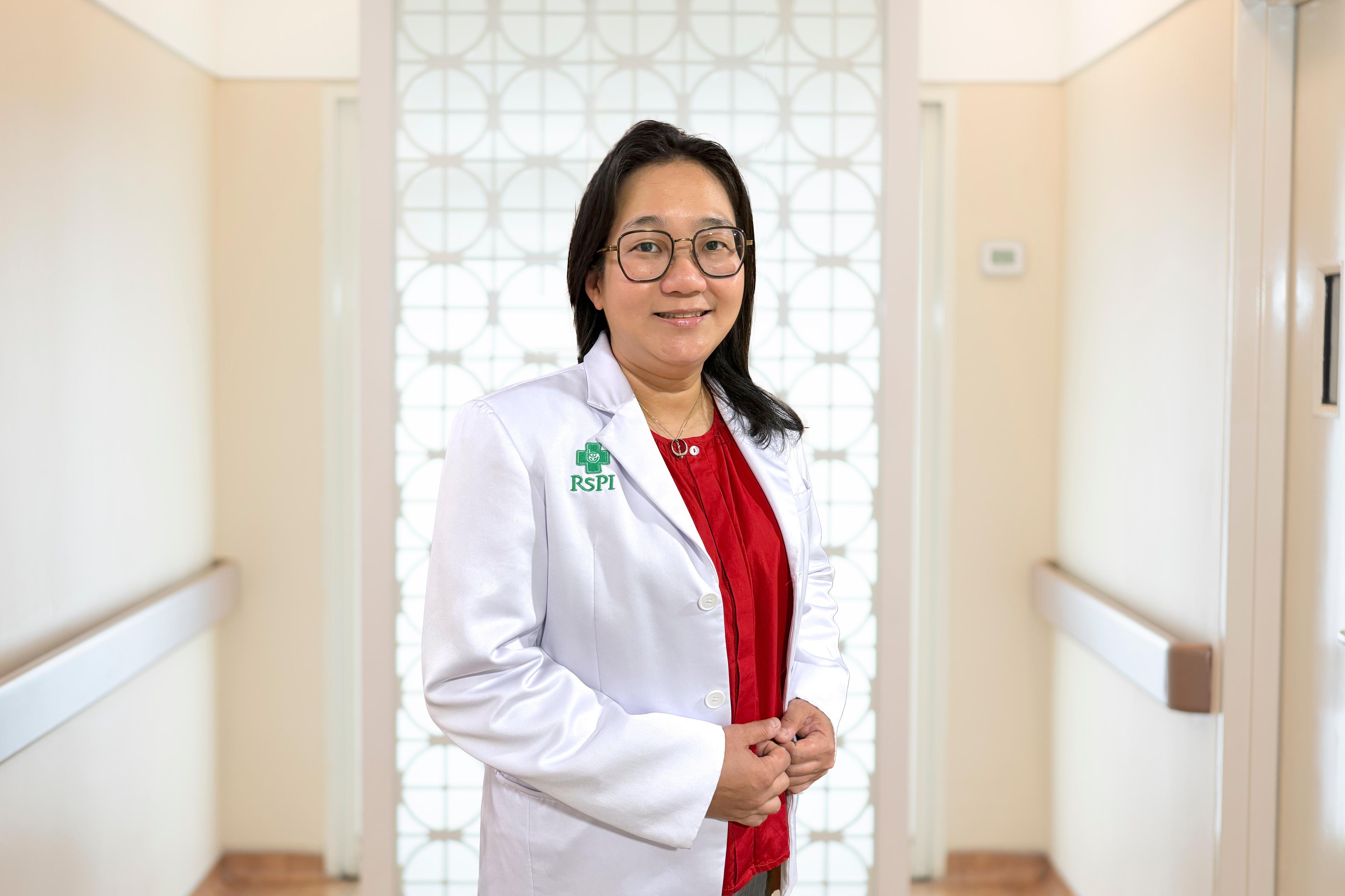 dr. Karmile, Sp. B.A
